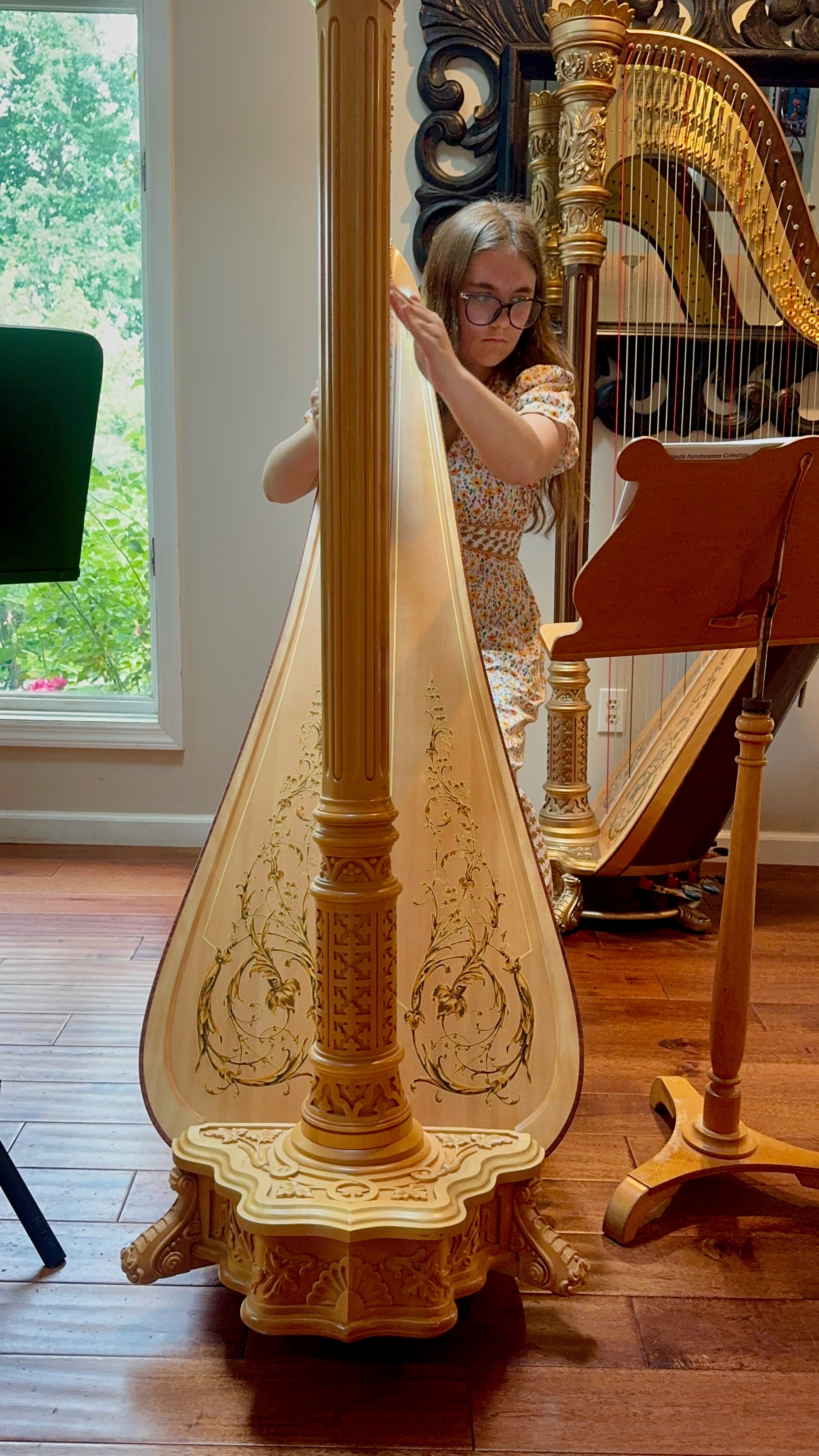 Harp student practicing in Marissa's private studio