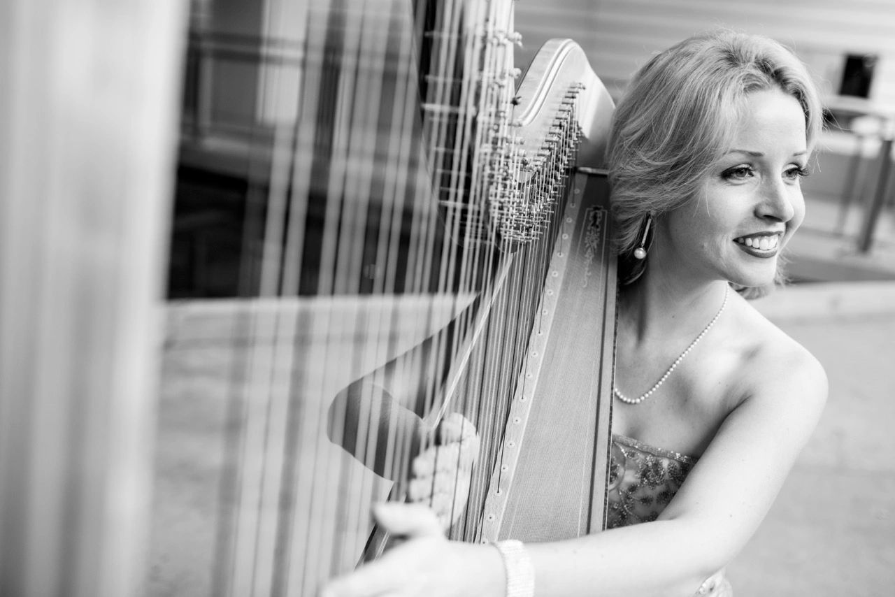Marissa portrait with harp black and white